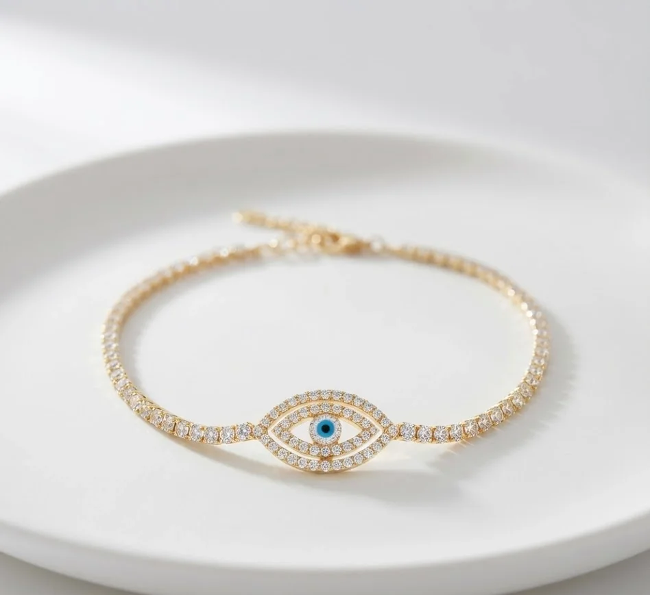 Gold-Tone Crystal Tennis Bracelet with Pavé Evil Eye Centerpiece